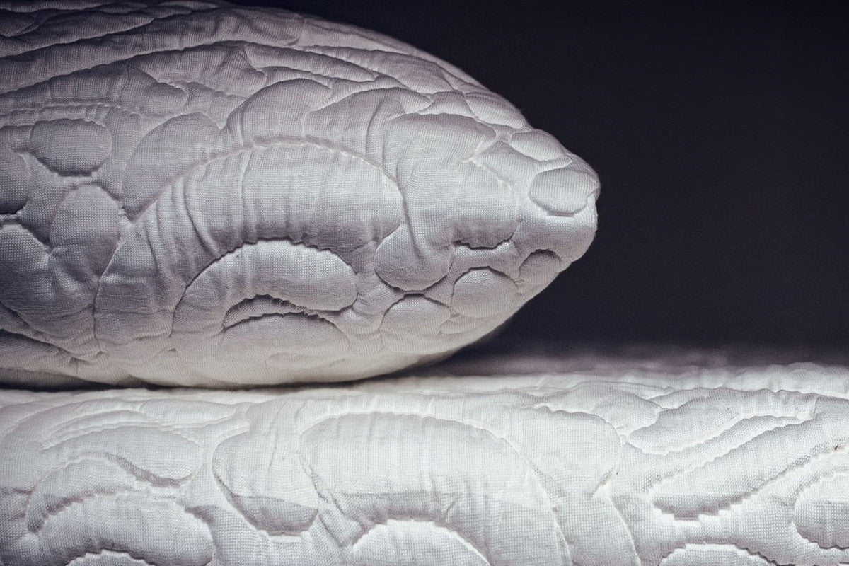 Posh+Lavish latex pillows on bed sideview