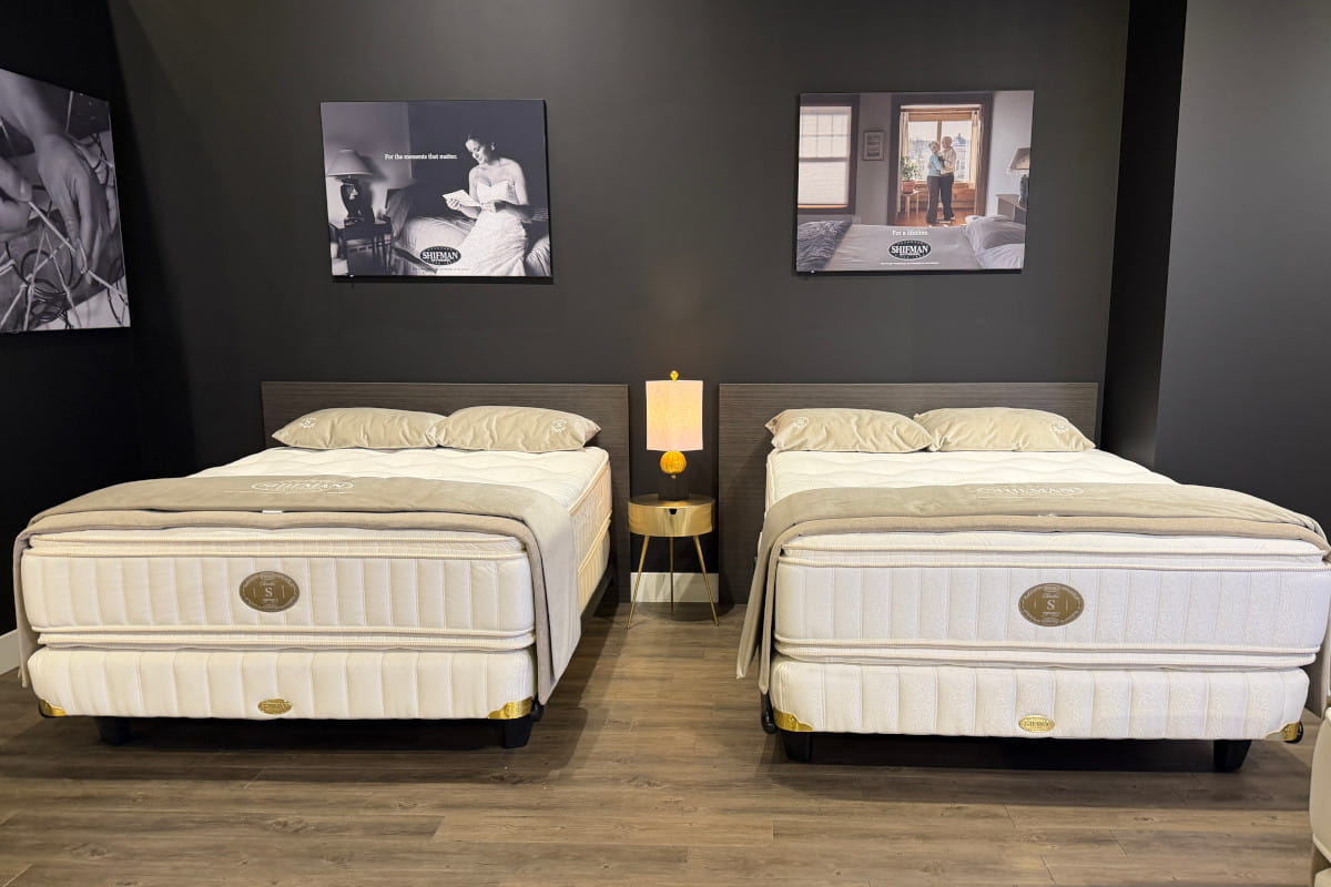 Shifman Timeless Collection mattress sets side by side on showroom floor